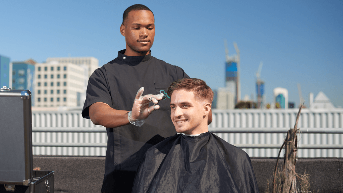 Mobile barber jobs - traveling barber giving haircut at home