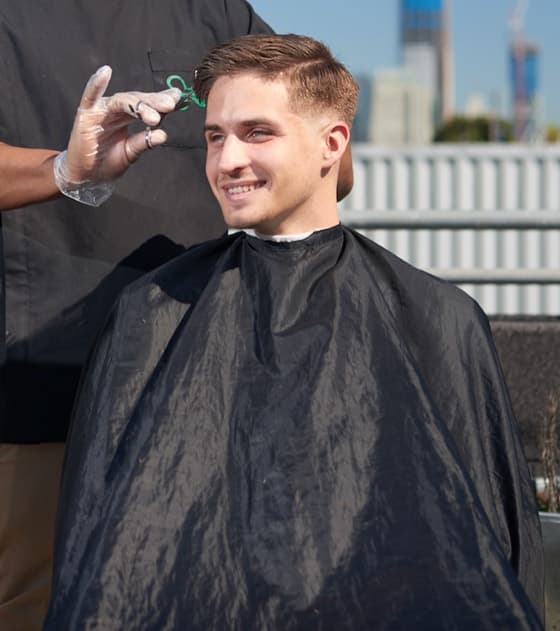 StylesGo mobile haircut service for a seated client